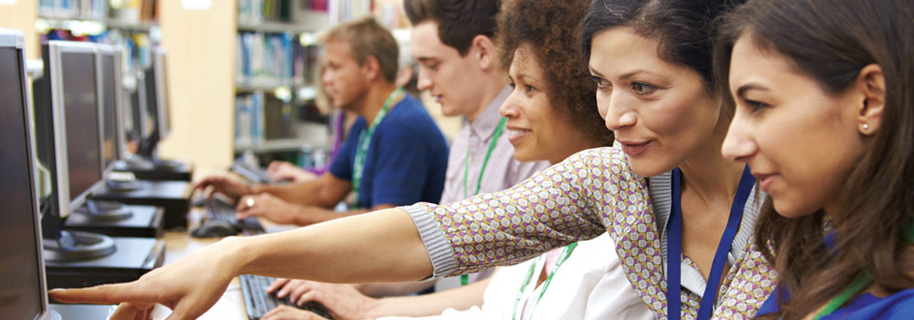 photo of people in computer lab setting